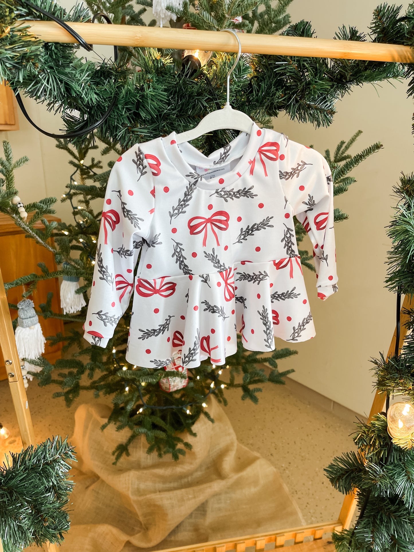 Holiday Bows Peplum Top